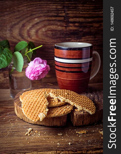 Still life with round wafers on wooden rustic background