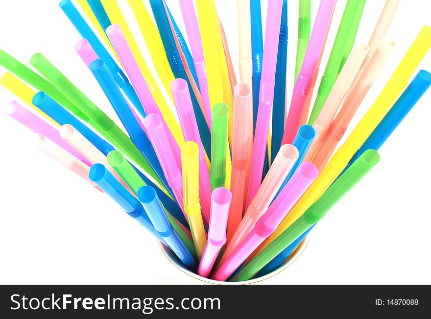 Colorful drinking straws on white