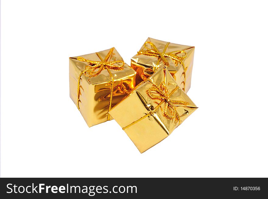 Heap of three isolated small yellow gifts. Heap of three isolated small yellow gifts