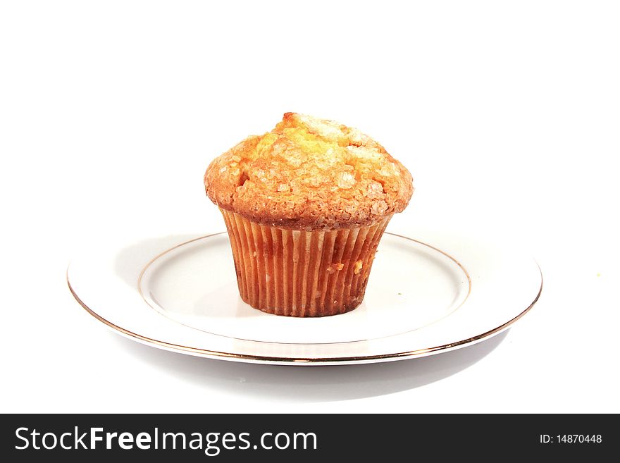 One muffins on white plate