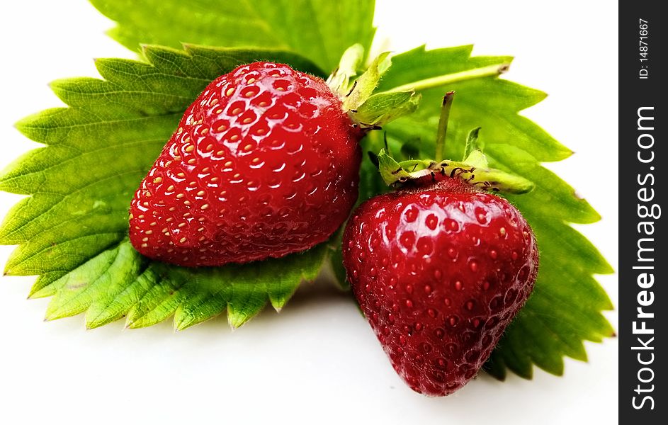 Isolated fruit - Strawberry on white background with leaves. Isolated fruit - Strawberry on white background with leaves
