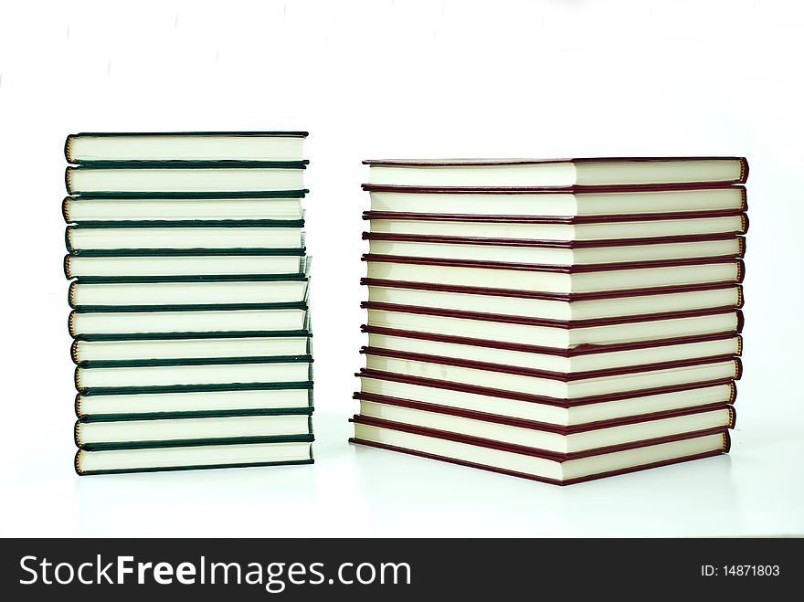 Green books isolated on white background
