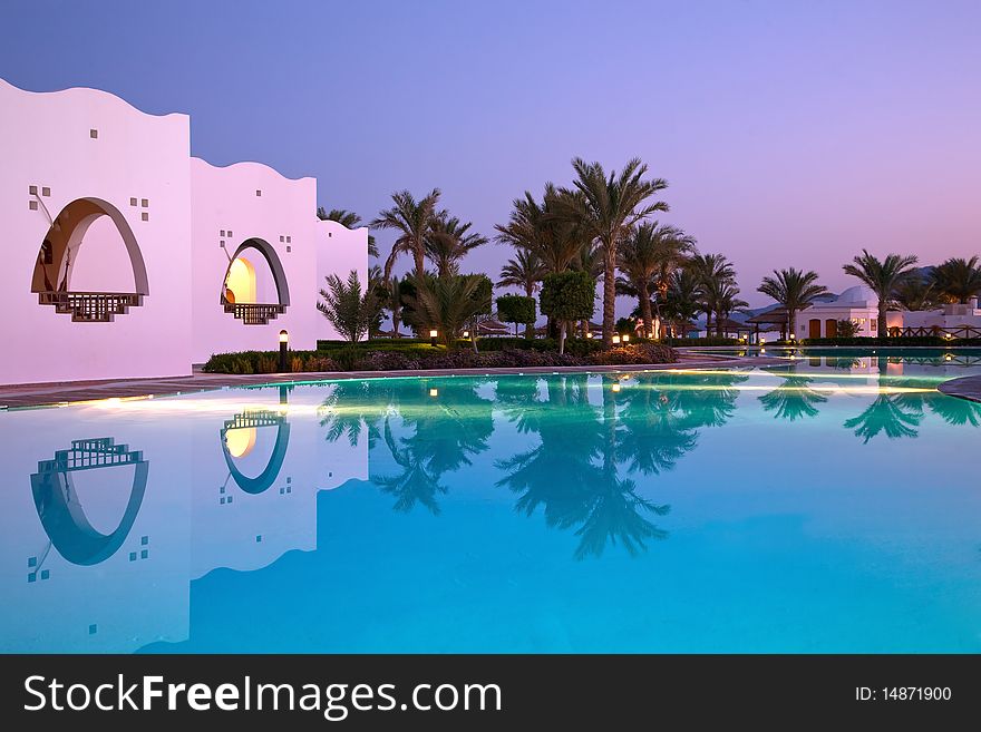 Evening reflection in swimming pool. Dahab. Egypt.