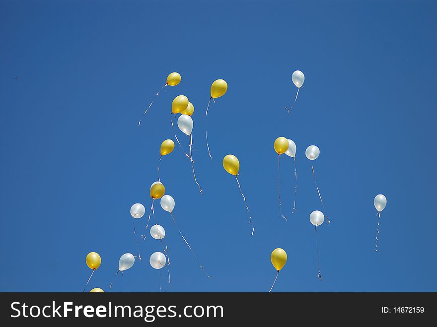 Balloons color yelow blue and white
