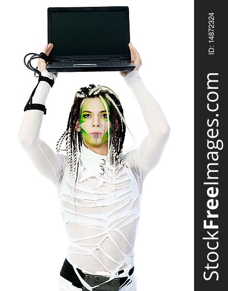 Shot of a futuristic young man with wires holding a laptop. Isolated over white background. Shot of a futuristic young man with wires holding a laptop. Isolated over white background.