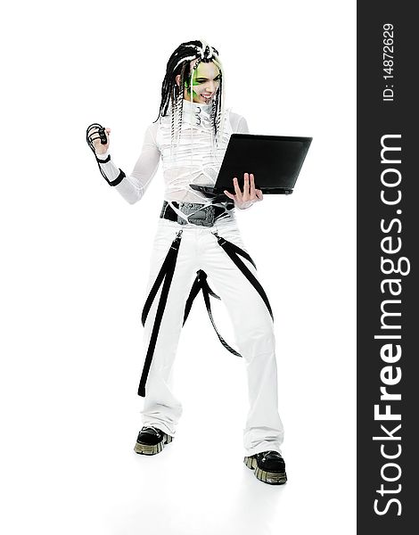 Shot of a futuristic young man with wires holding a laptop. Isolated over white background. Shot of a futuristic young man with wires holding a laptop. Isolated over white background.