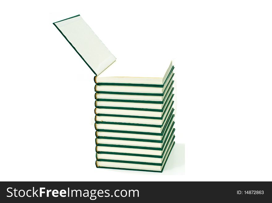 Green books closeup isolated on white background