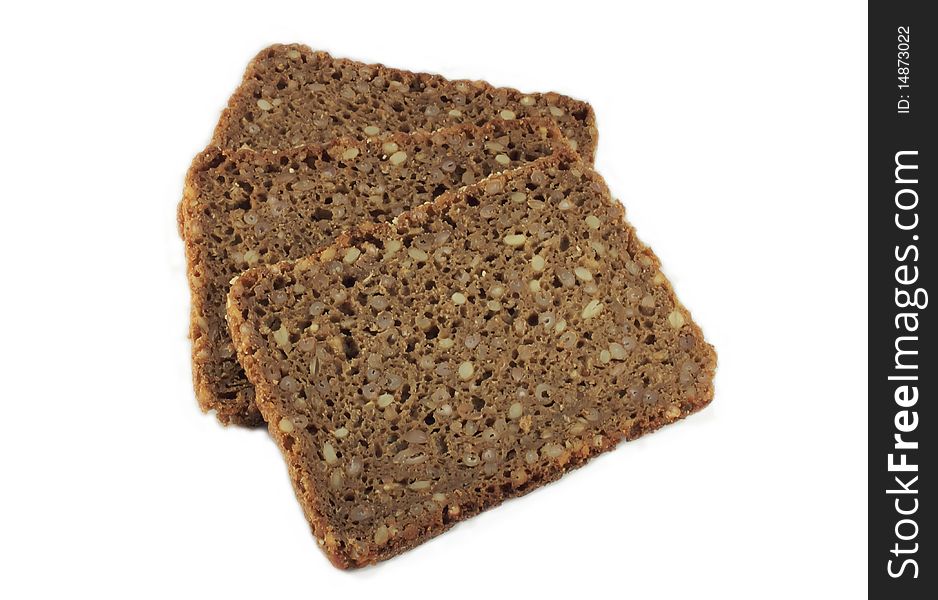 Three slices of rye bread on white background