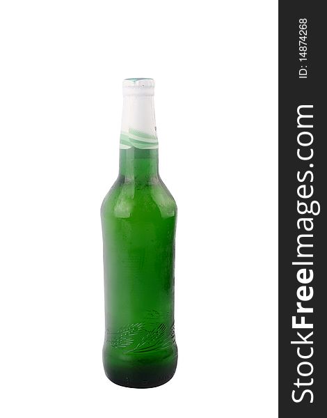 A bottle of beer is slanted with white background