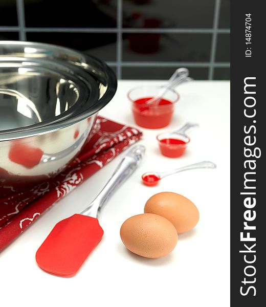 Silver mixing bowls on a kitchen bench