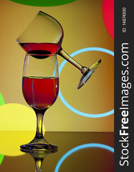 Wine glasses on abstract circle background. Wine glasses on abstract circle background