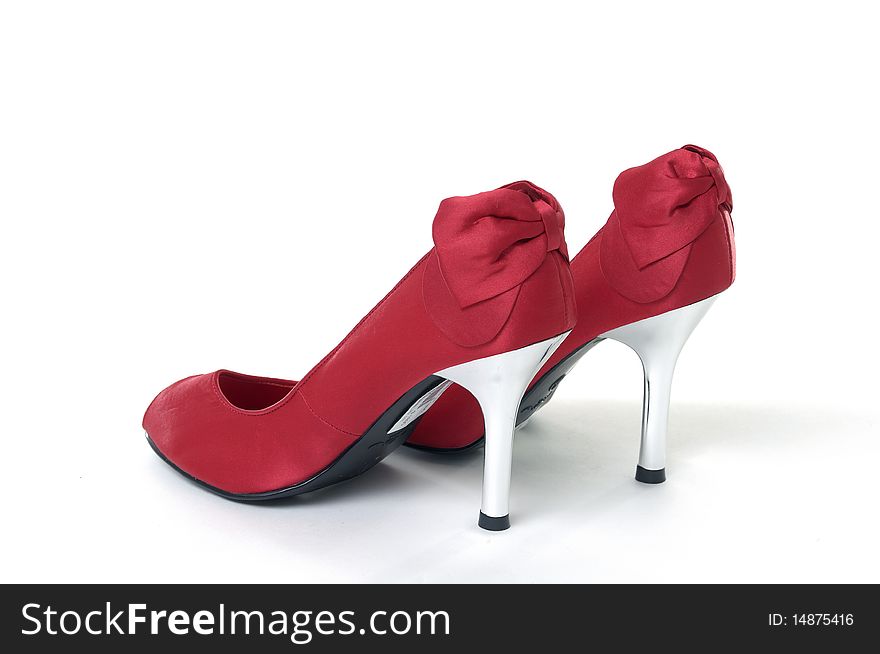 Red high heel shoe on white background. Red high heel shoe on white background