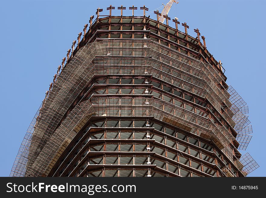 Concrete Building Construction against the blue cloudless sky