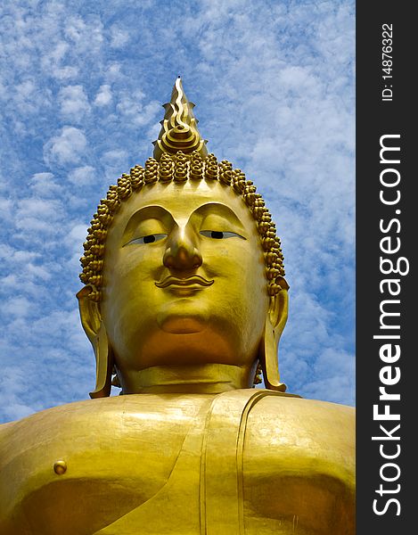 Face Huge Buddha image with blue sky