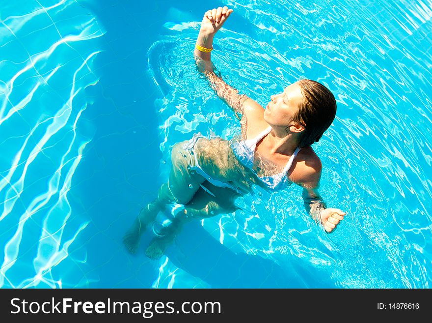 Woman In A Pool