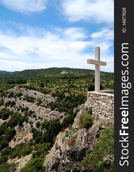 White cross on a mountain. White cross on a mountain.