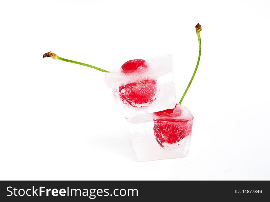 Two frozen cherries on white backgoround.