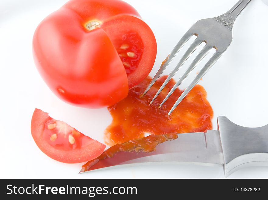Tomato ketchup sauce with knife and fork. Tomato blood funny theme