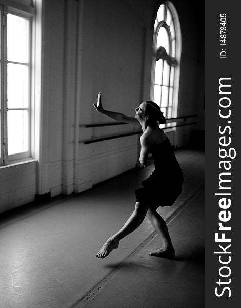 Dancer practicing in a studio. Dancer practicing in a studio