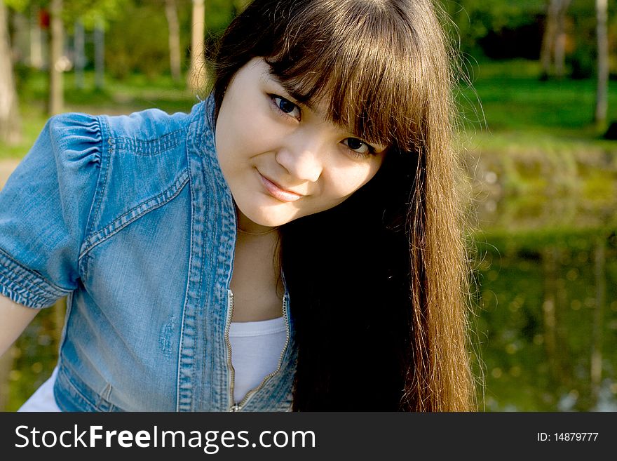 Girl walking in summer park. Girl walking in summer park