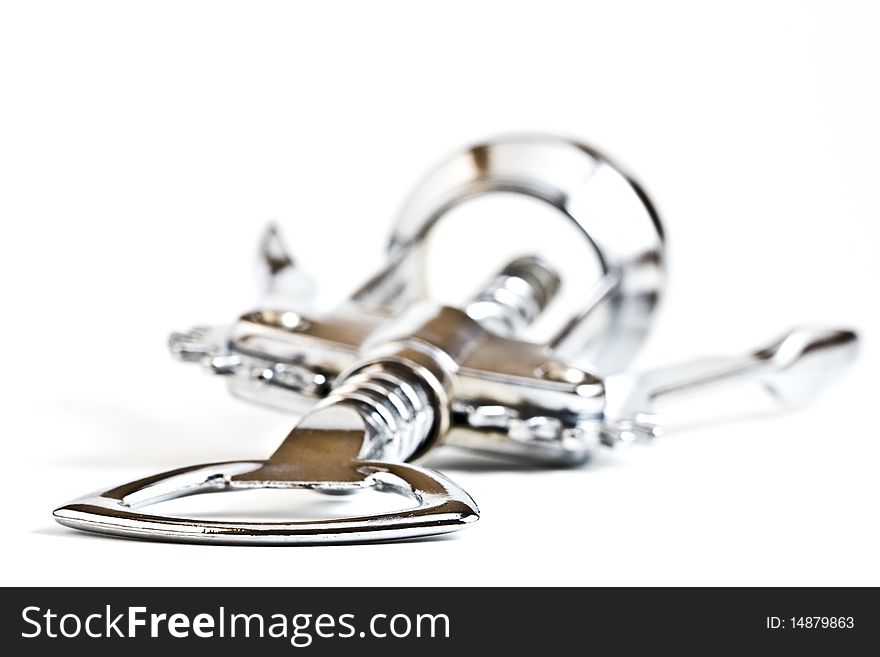 Bottle opener / corkscrew closeup isolated on white background