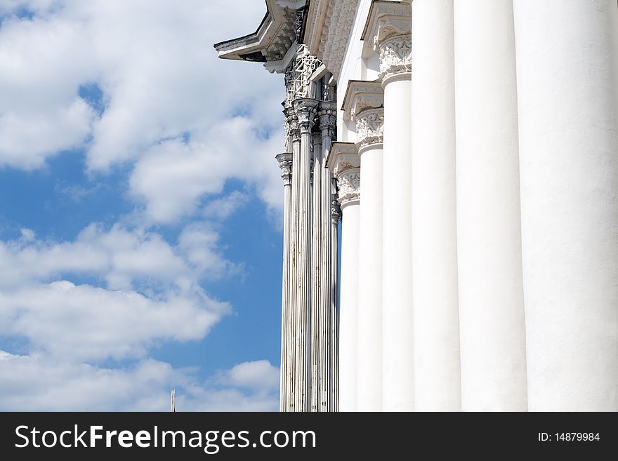 Columns on blue sky background