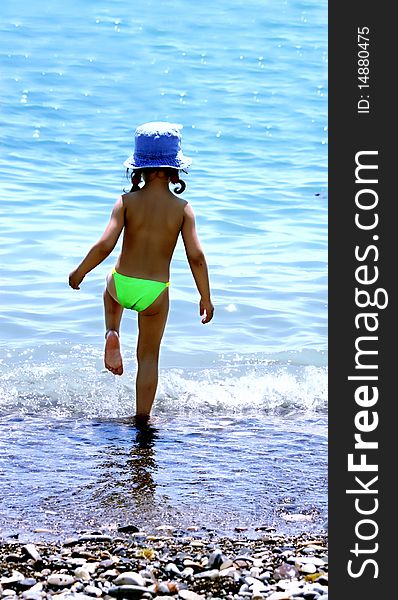 Child on the shore of the beach resort. Child on the shore of the beach resort