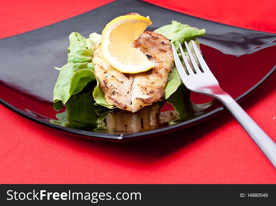Grilled fish with fresh lemon juice