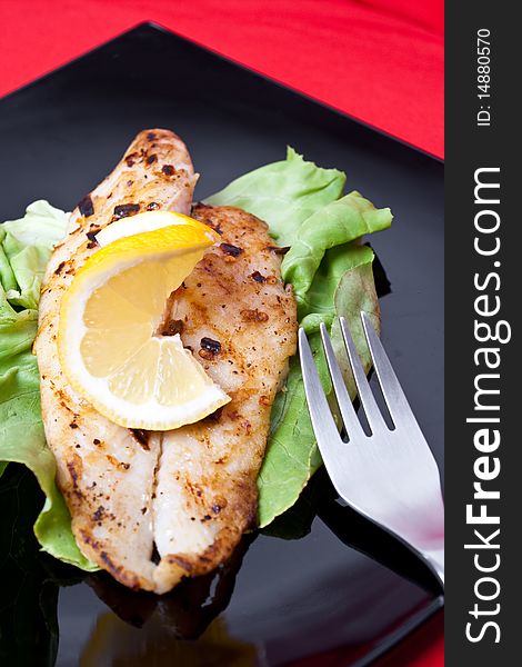 Grilled fish with fresh lemon juice