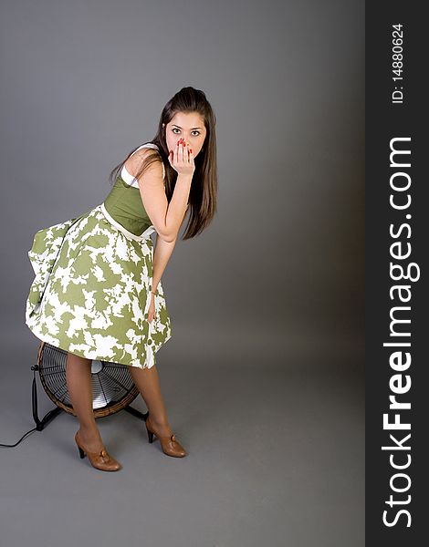 Pretty pinup girl posing in studio