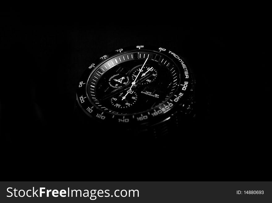 Expensive black watch in the dark. Expensive black watch in the dark