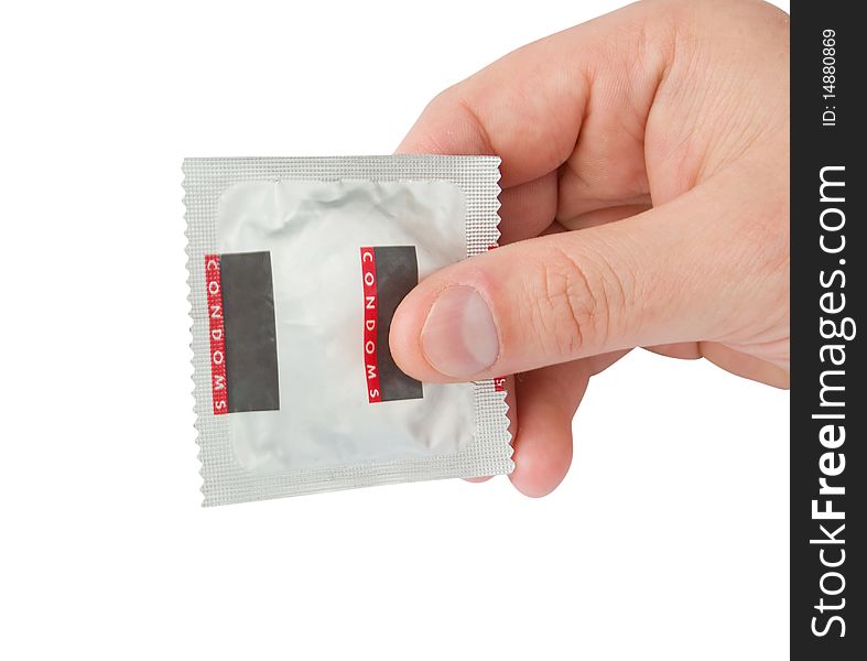 Condom In Men Hand On White