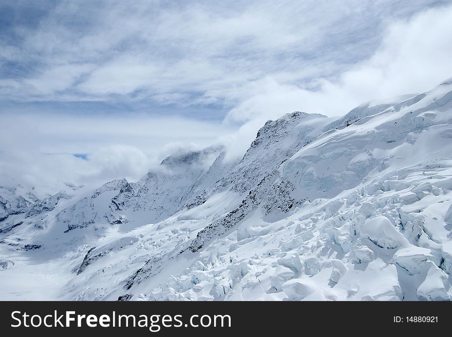 Snow mountains in cloudy weather, Top of Europe, Alps, Switzerland