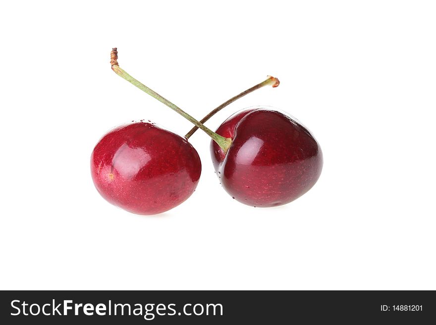 Red ripe cherries on a white background.