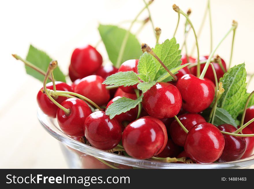 Red cherries in a bowl