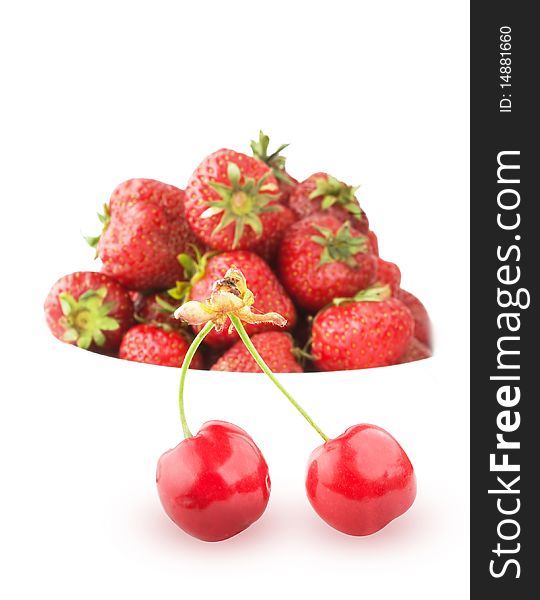 Ripe cherry on strawberry background over white