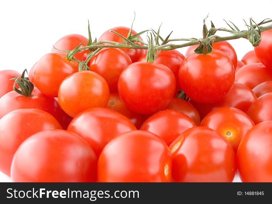 Shiny Cherry tomatoes with branch