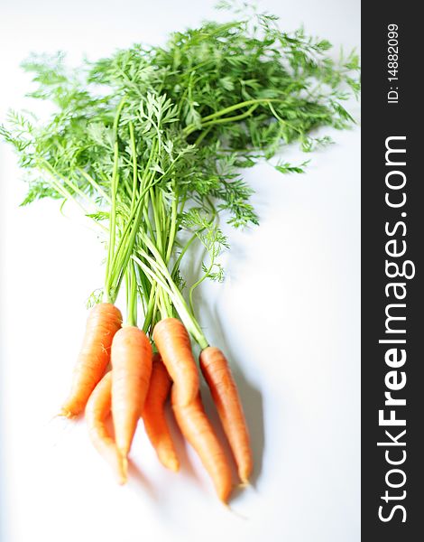 Shot of a bunch of carrots on white