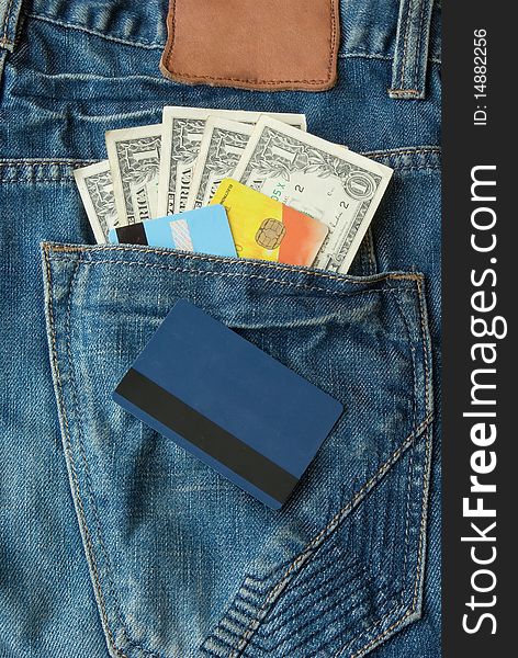 Money with credit cards in pocket