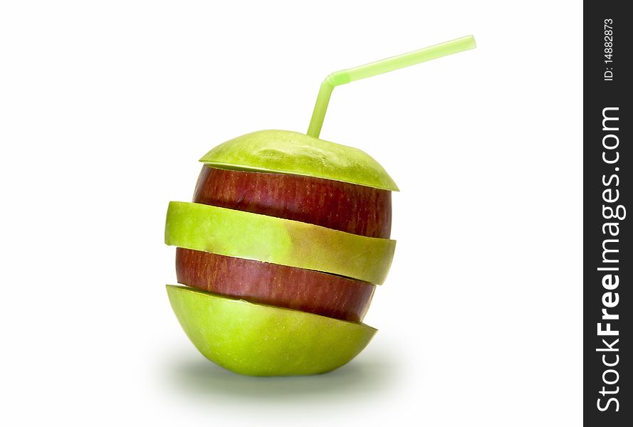 Red and green apple slices isolated on white background. In apple juice straw stuck.