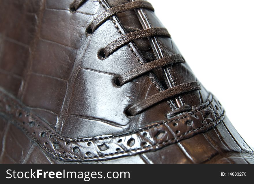 Close up photo of mans brown shoe. Close up photo of mans brown shoe
