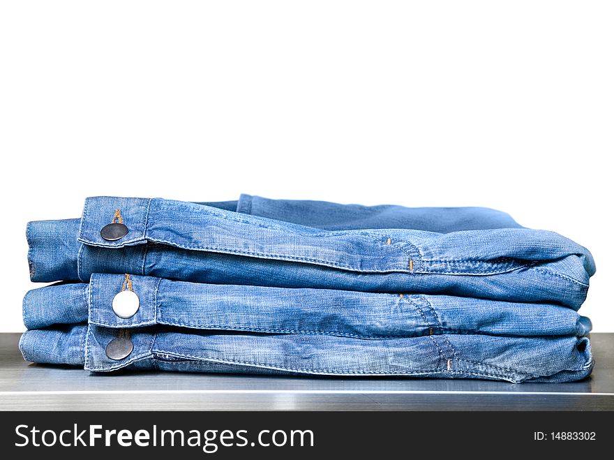 Blue jeans in store isolated on white background