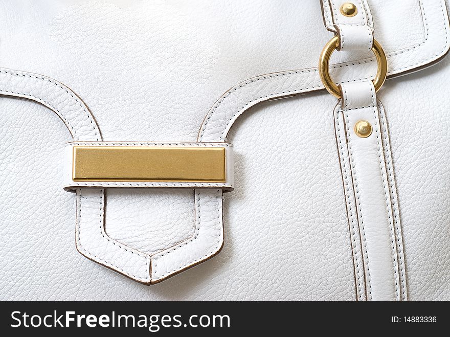 Macro of luxury white leather female bag. Macro of luxury white leather female bag