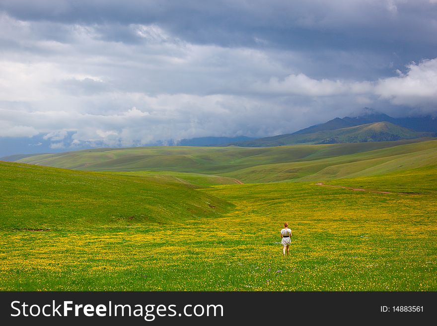 Beautiful mountain landscape with the girl. Beautiful mountain landscape with the girl