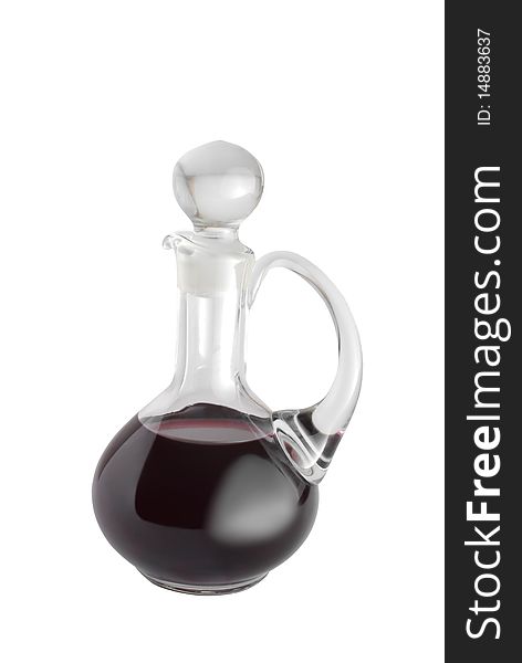 Red wine in glass decanter. Isolated on white background. Red wine in glass decanter. Isolated on white background.