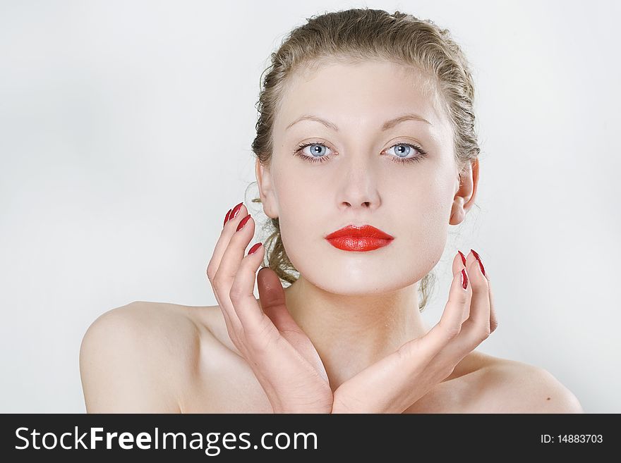 Photo of a beautiful woman with red lips