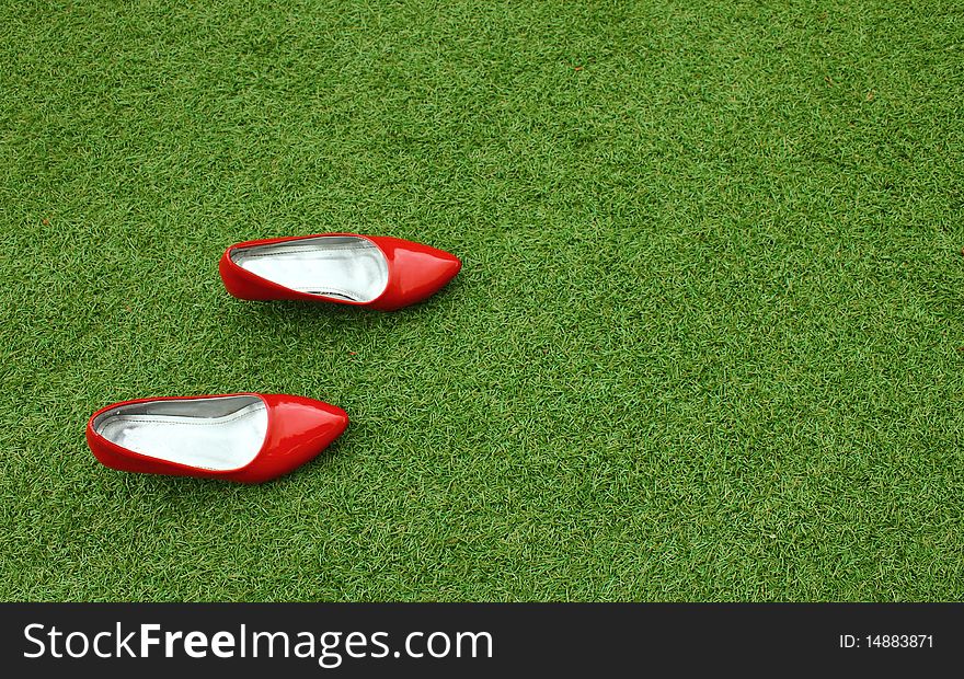 Red Female Shoes On Grass