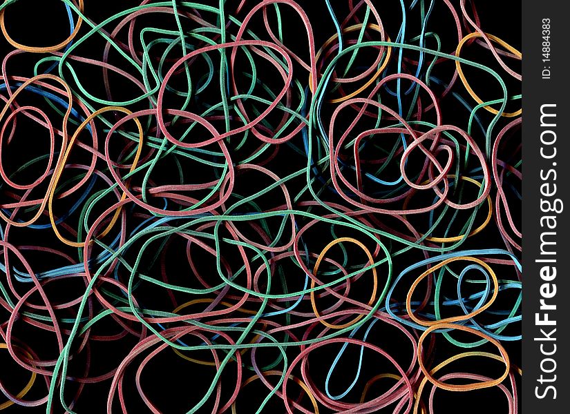 Closeup abstract rubber band in mess isolated