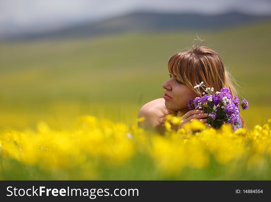 The girl with a bunch of flowers