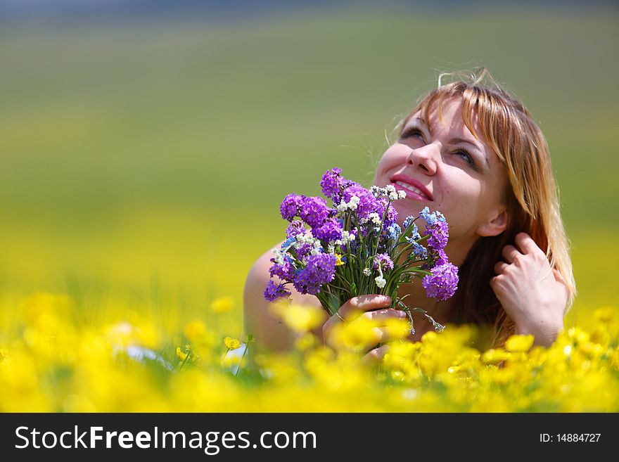 The girl with a bunch of flowers